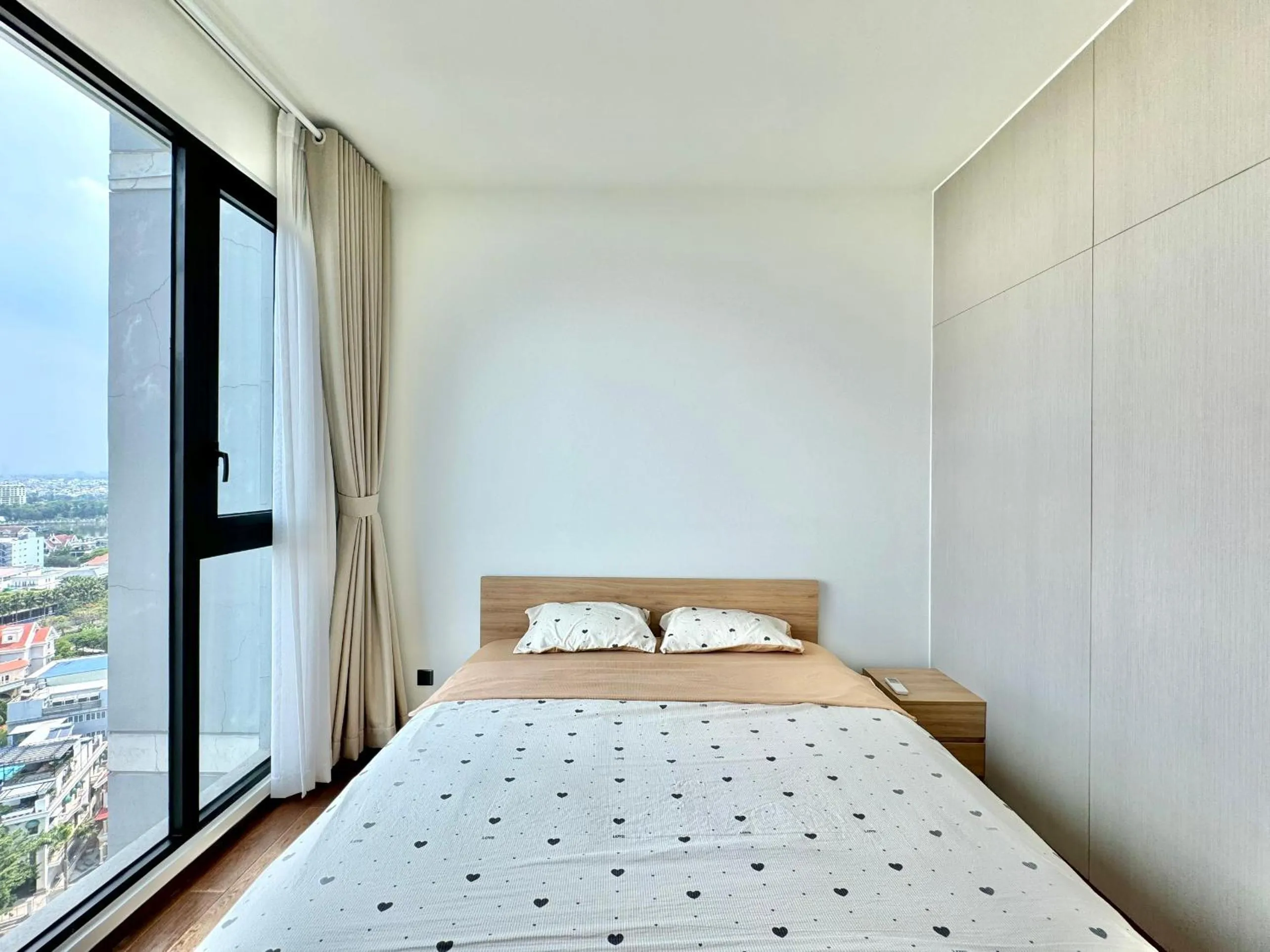 Bed in Homie's Dedge Thao Dien Luxury Apartment