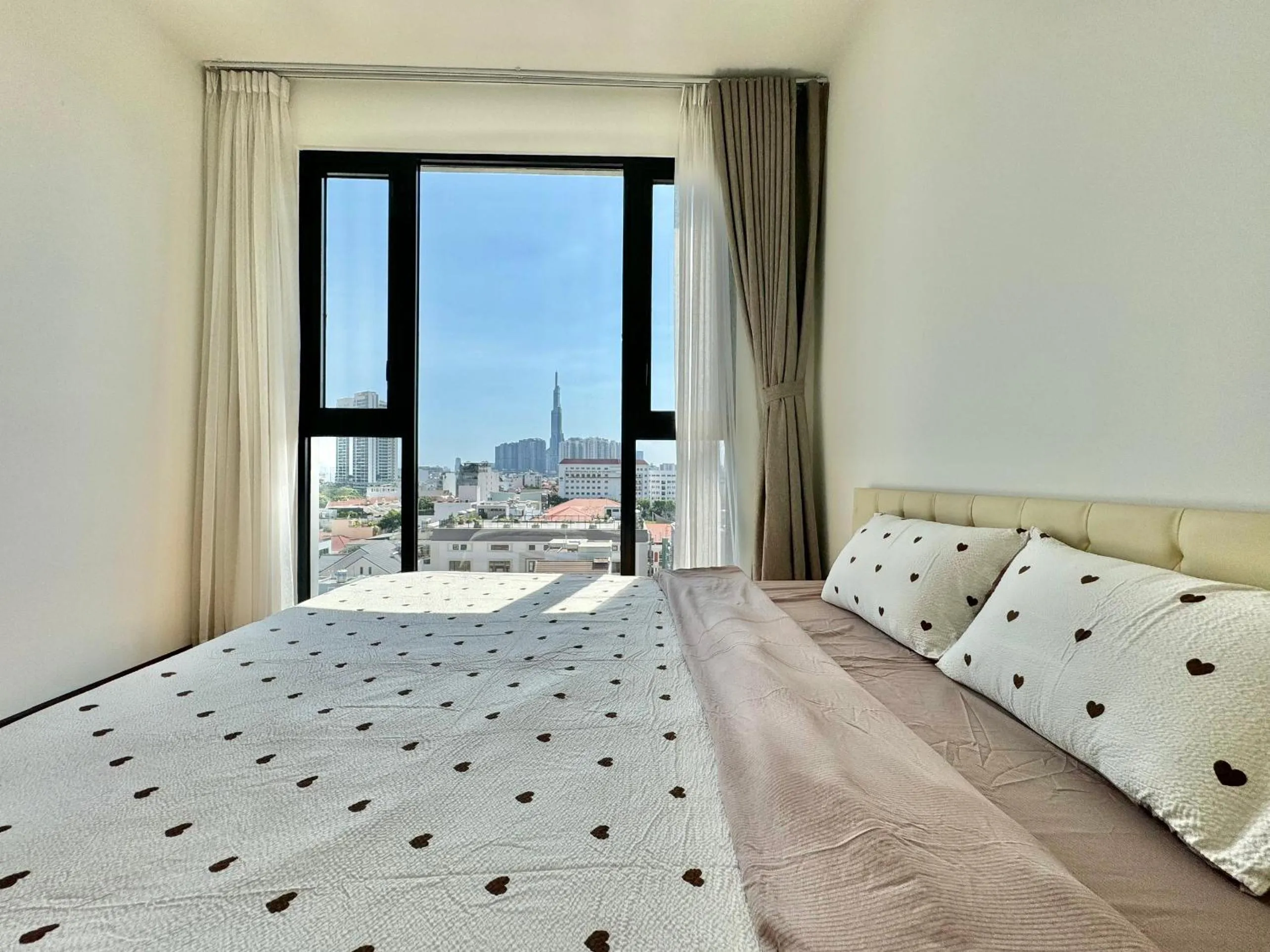 Bed in Homie's Dedge Thao Dien Luxury Apartment