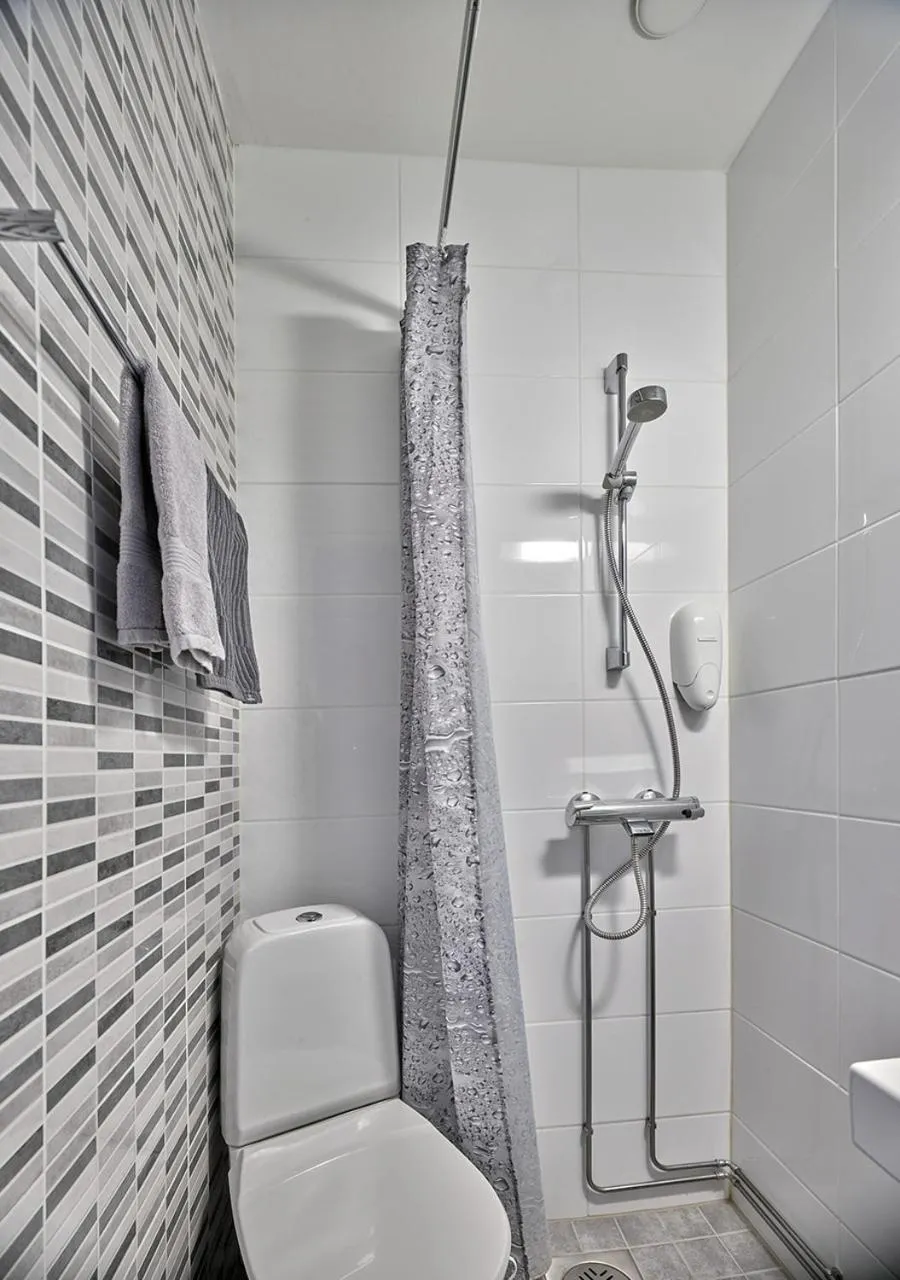 Toilet in Hotelli-Ravintola Gasthaus Lohja