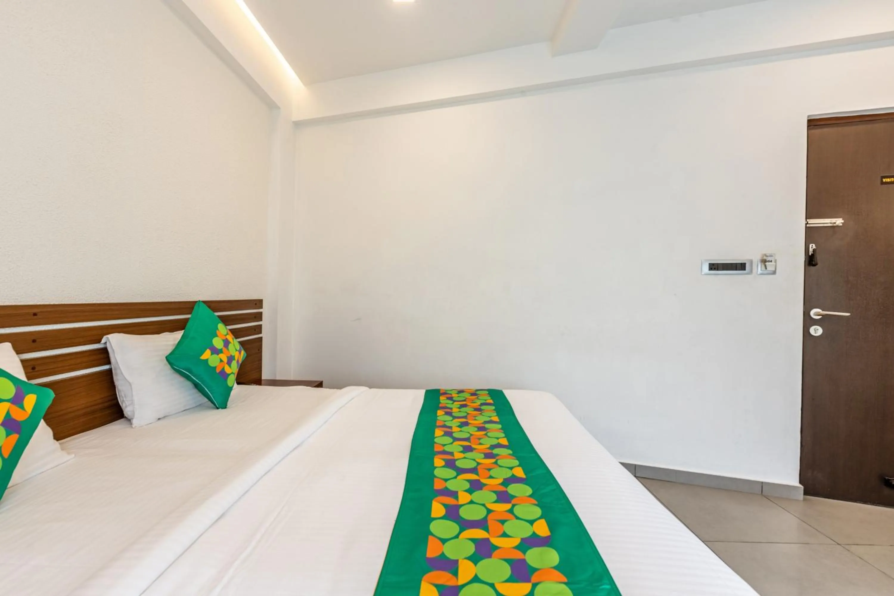 Bedroom, Bed in Treebo De Cloud 9 Regency