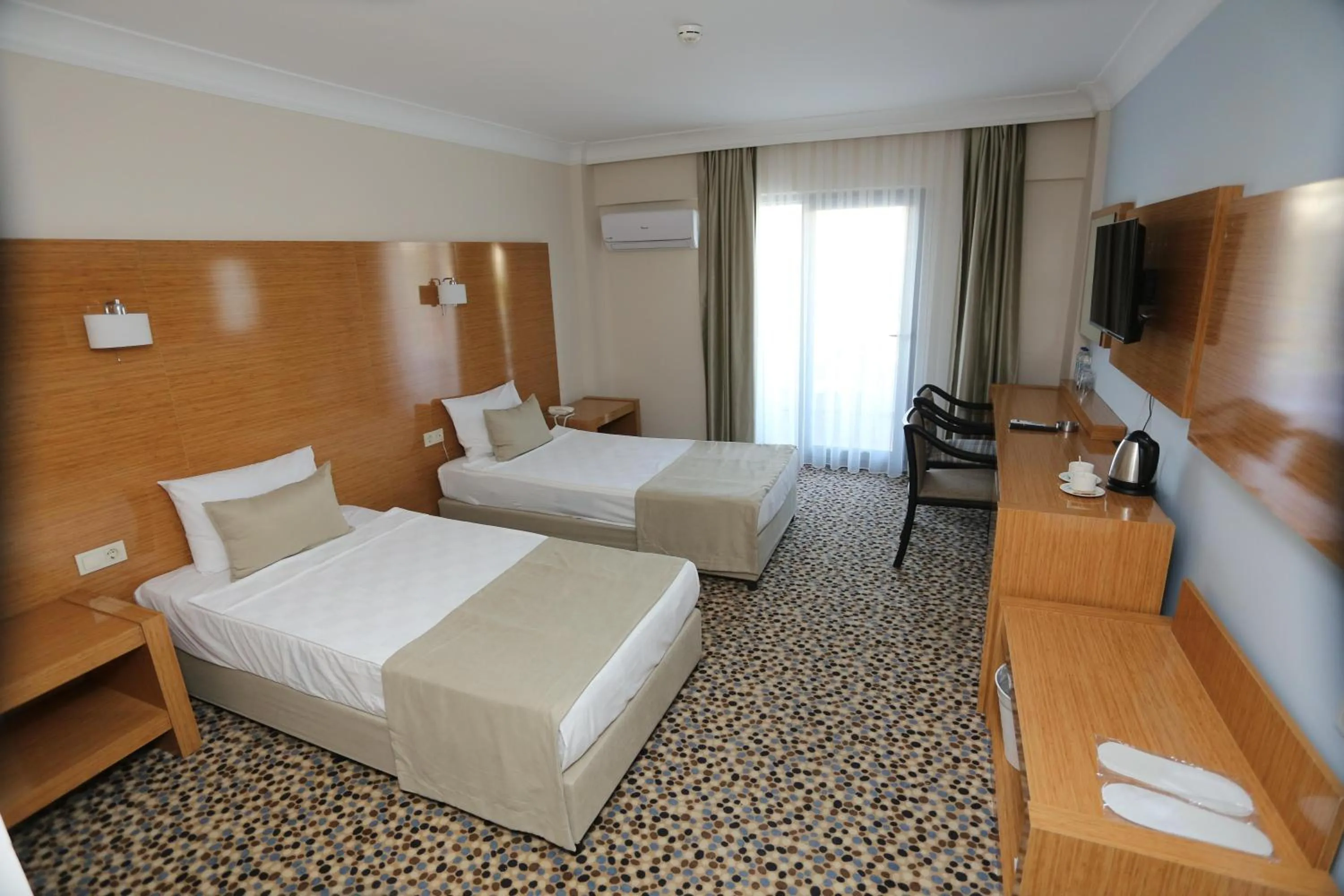 Photo of the whole room, Bed in Ada Newday Resort Hotel