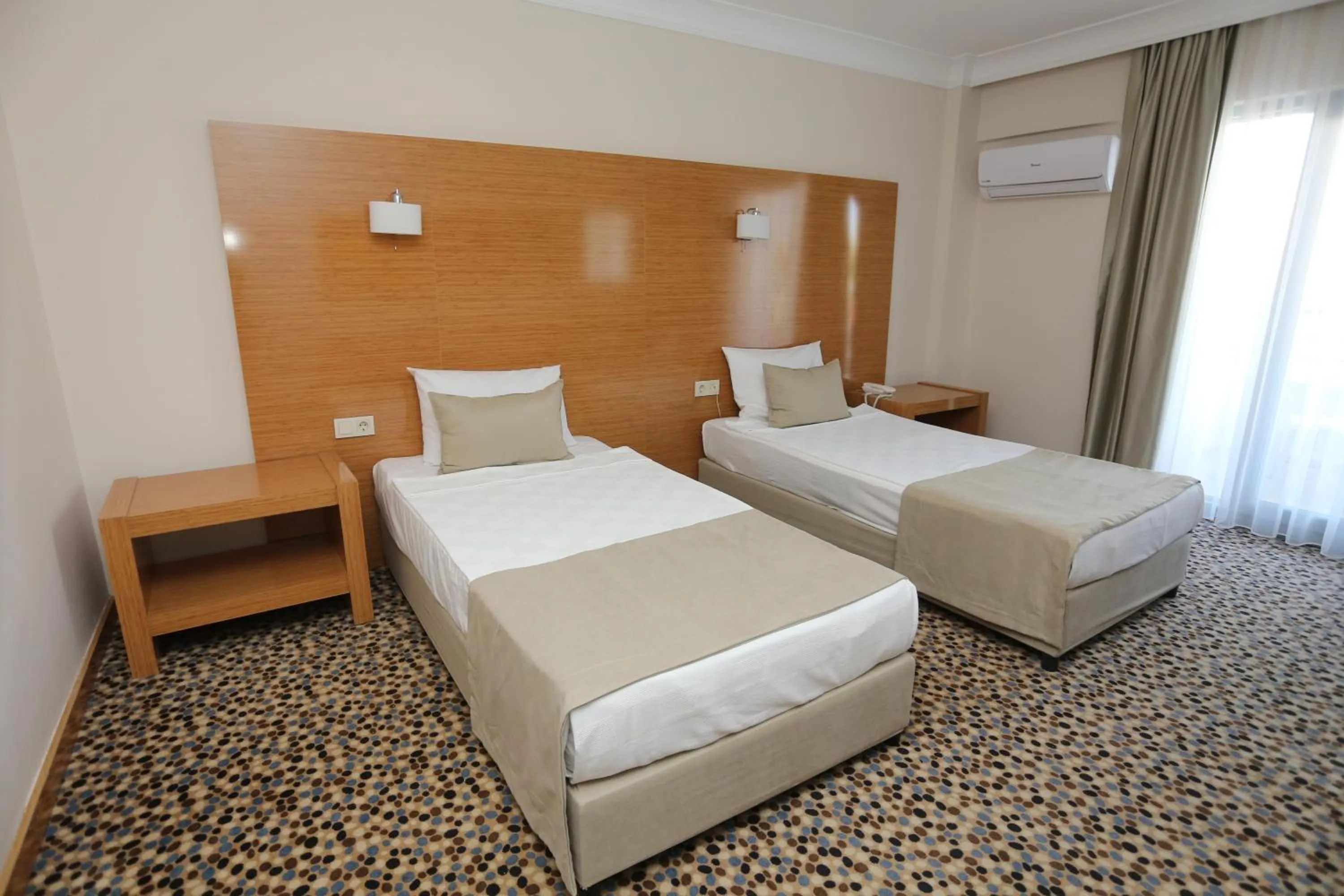 Photo of the whole room, Bed in Ada Newday Resort Hotel