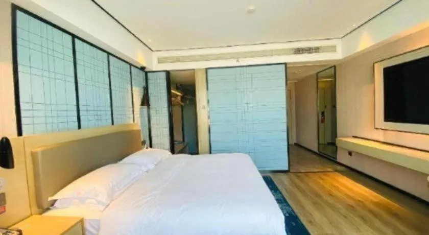Bed in Echarm Hotel Changjiang Shilu