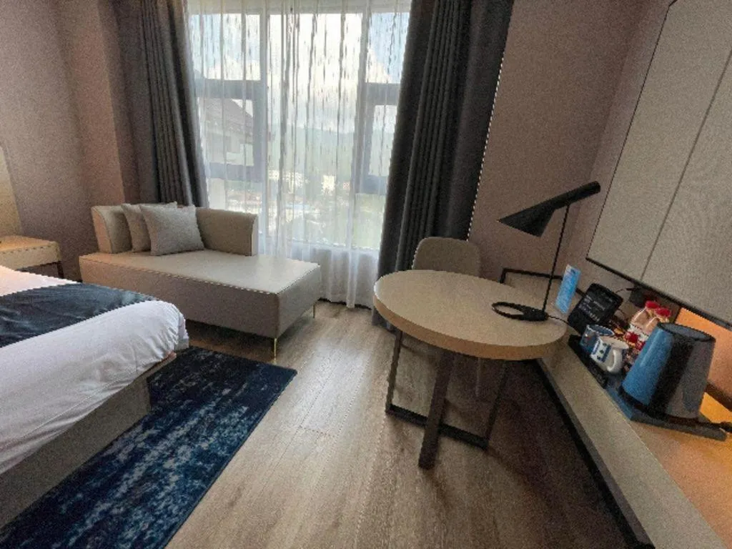 Bed in Echarm Hotel Changjiang Shilu