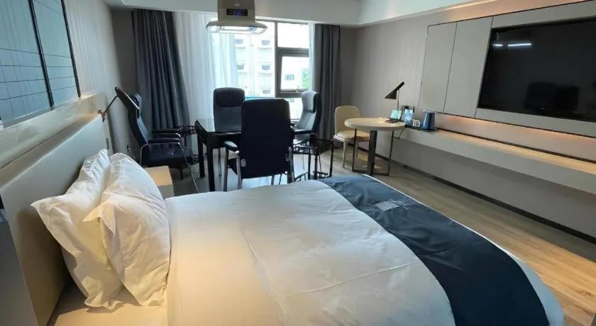 Bed in Echarm Hotel Changjiang Shilu
