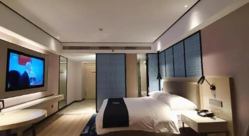 Bed in Echarm Hotel Changjiang Shilu