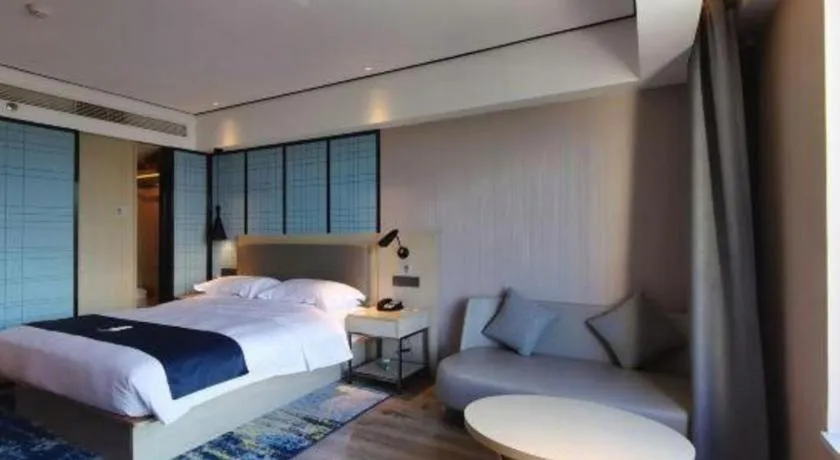 Bed in Echarm Hotel Changjiang Shilu