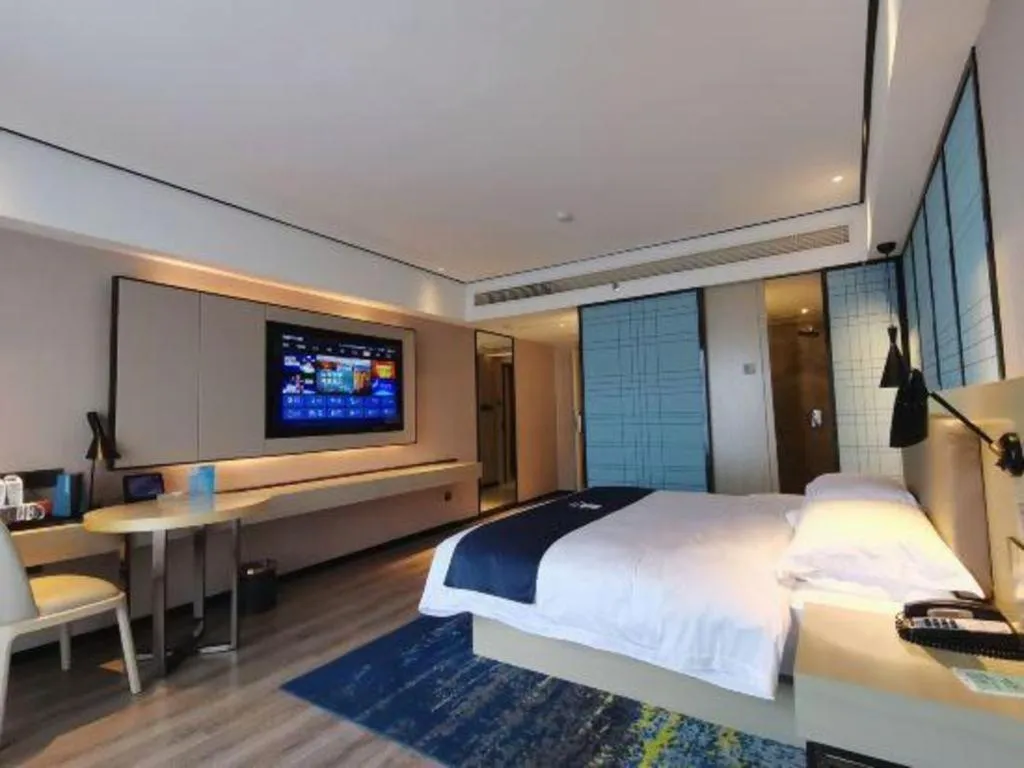 Bed in Echarm Hotel Changjiang Shilu