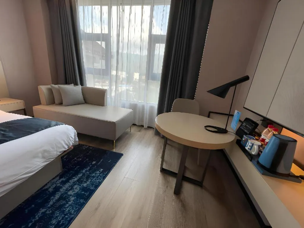 Bed in Echarm Hotel Changjiang Shilu