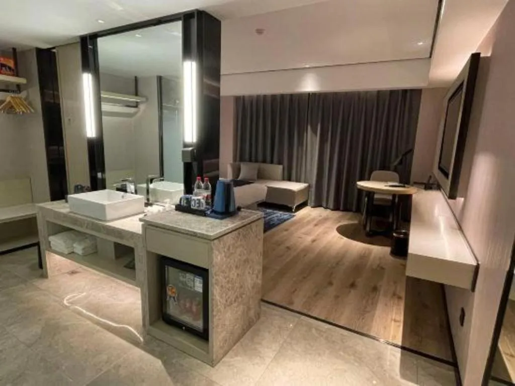 Bed in Echarm Hotel Changjiang Shilu