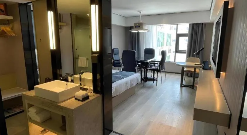 Bed in Echarm Hotel Changjiang Shilu