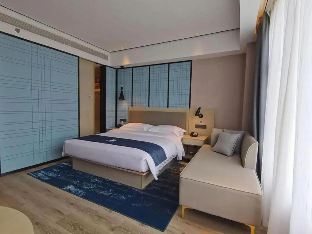 Bed in Echarm Hotel Changjiang Shilu