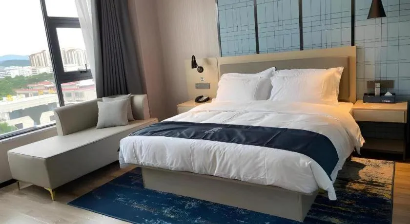 Bed in Echarm Hotel Changjiang Shilu