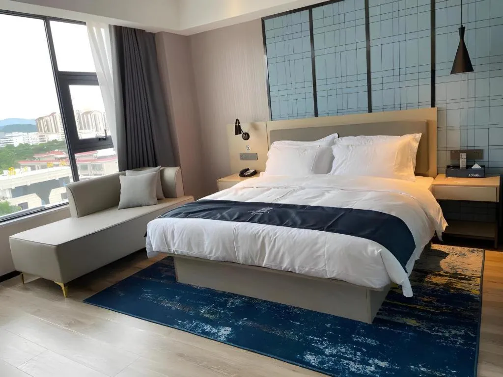 Bed in Echarm Hotel Changjiang Shilu