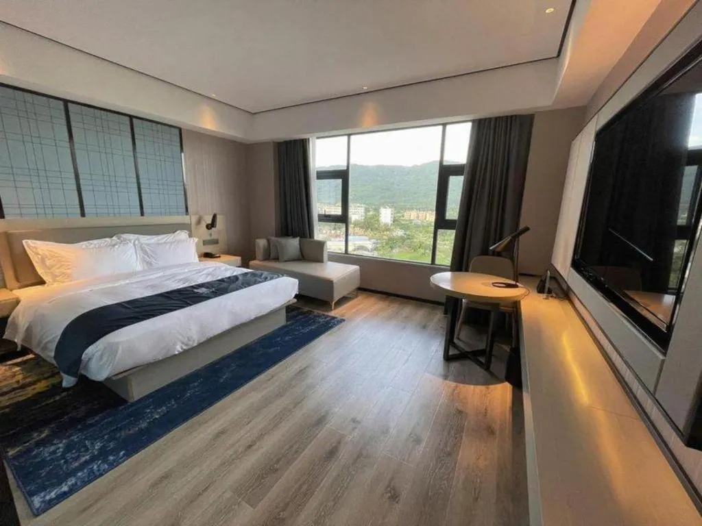 Bed in Echarm Hotel Changjiang Shilu