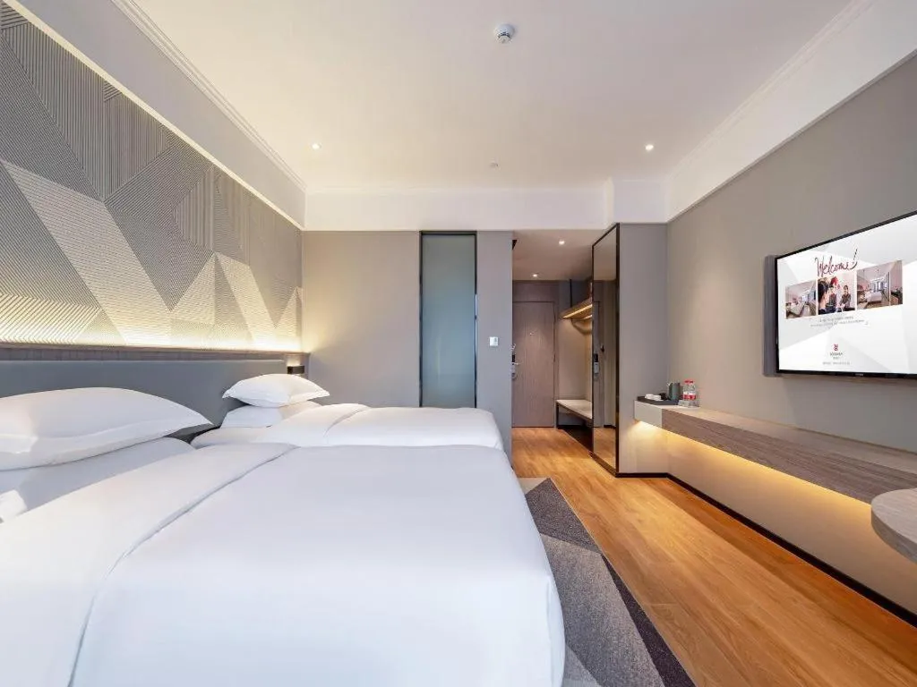 Bed in Borrman Hotel Nanning Wuming Center