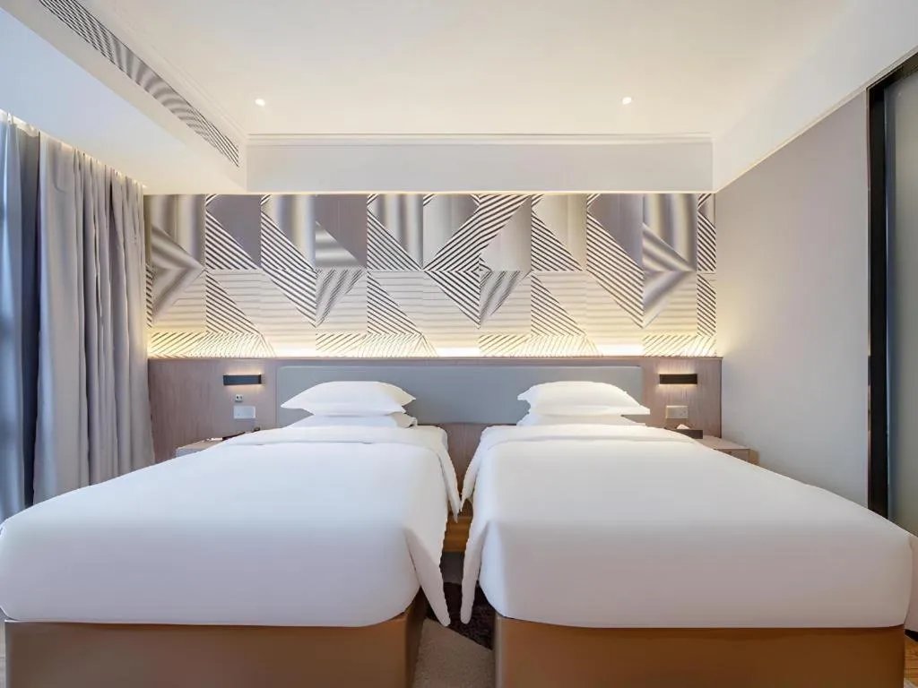 Bed in Borrman Hotel Nanning Wuming Center