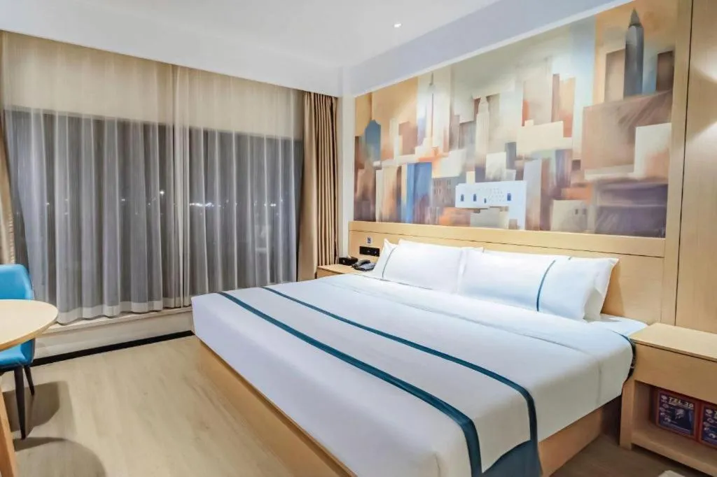 Bed in City Comfort Inn Wuhan Yangluo Wanda Plaza