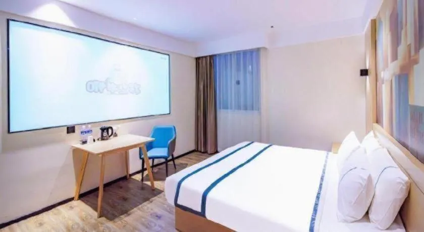 Bed in City Comfort Inn Wuhan Yangluo Wanda Plaza