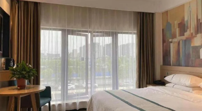 Bed in City Comfort Inn Wuhan Yangluo Wanda Plaza