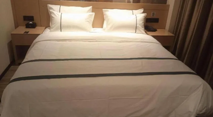 Bed in City Comfort Inn Wuhan Yangluo Wanda Plaza