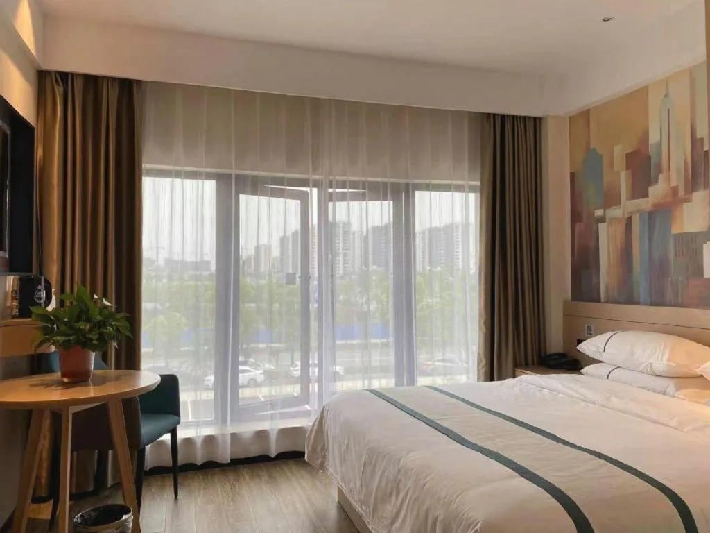 Bed in City Comfort Inn Wuhan Yangluo Wanda Plaza