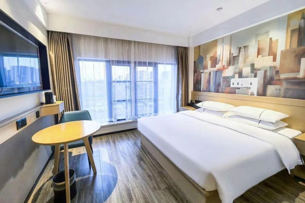 Bed in City Comfort Inn Wuhan Yangluo Wanda Plaza