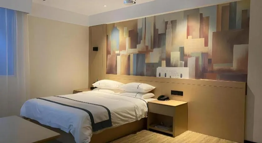 Bed in City Comfort Inn Wuhan Yangluo Wanda Plaza