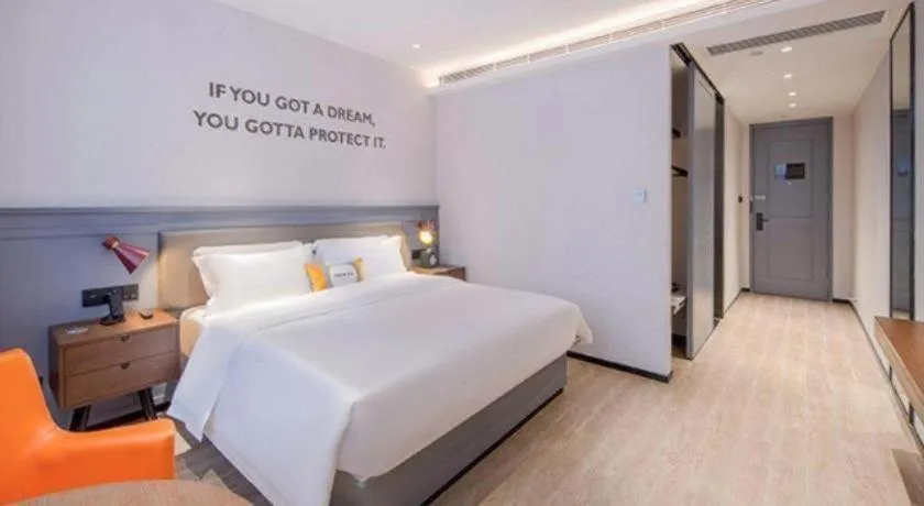 Bed in City Comfort Premier Hotel Nanning Guangxi University Zoo Metro Station