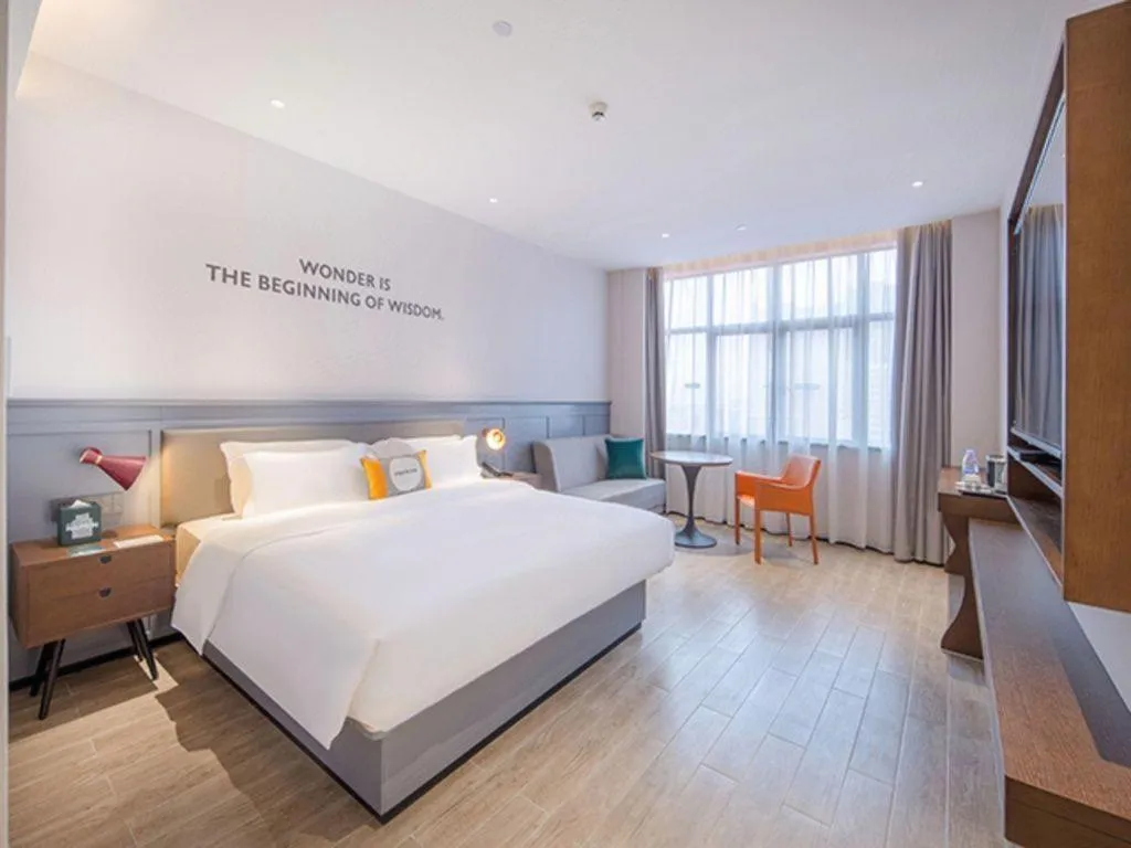 Bed in City Comfort Premier Hotel Nanning Guangxi University Zoo Metro Station