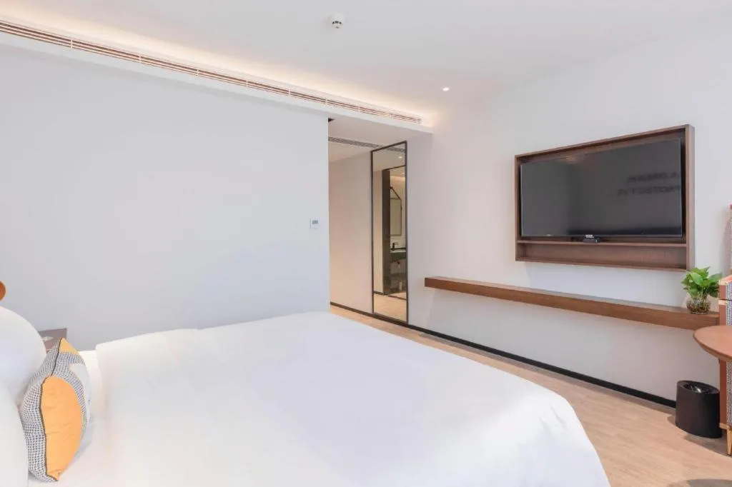 Bed in City Comfort Premier Hotel Nanning Guangxi University Zoo Metro Station