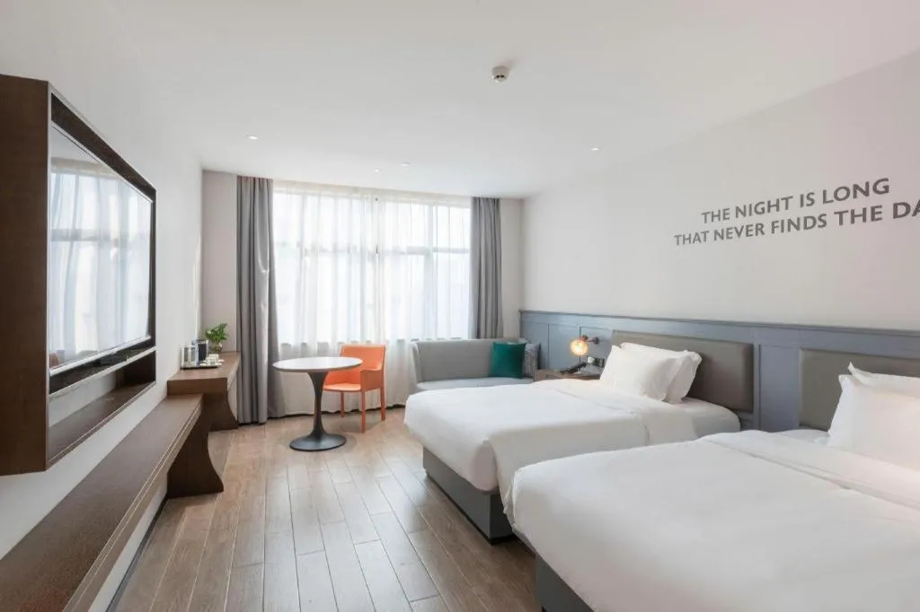 Bed in City Comfort Premier Hotel Nanning Guangxi University Zoo Metro Station