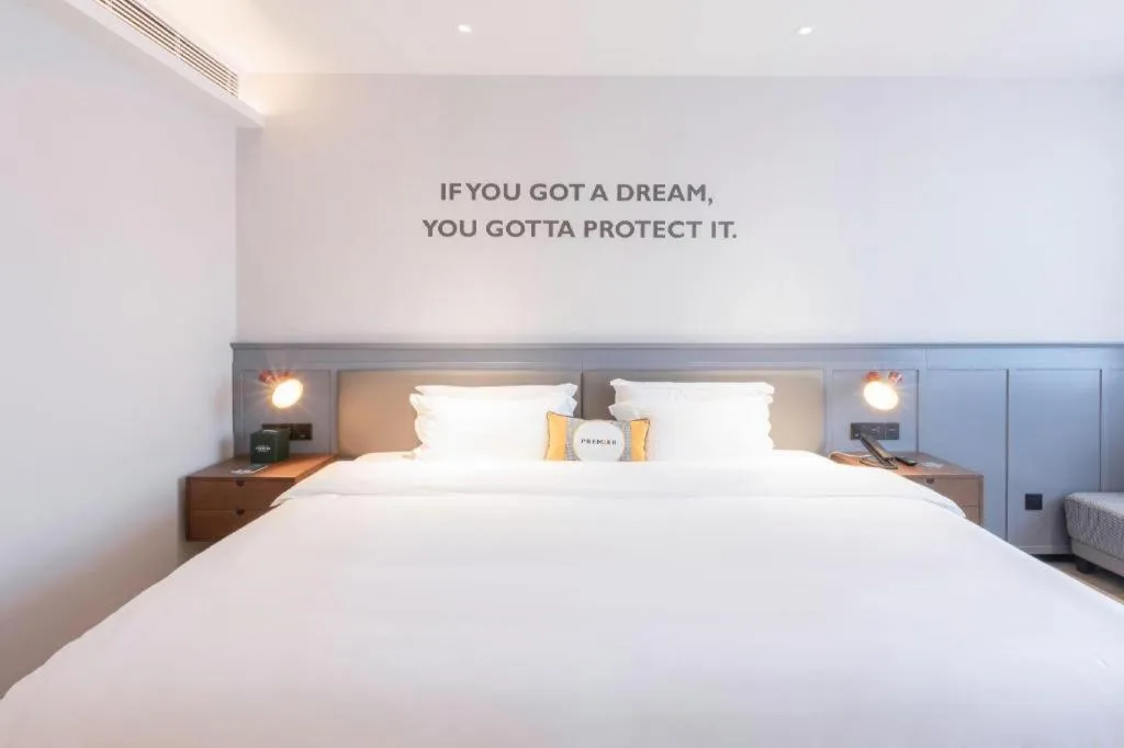 Bed in City Comfort Premier Hotel Nanning Guangxi University Zoo Metro Station