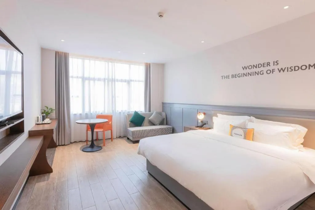 Bed in City Comfort Premier Hotel Nanning Guangxi University Zoo Metro Station