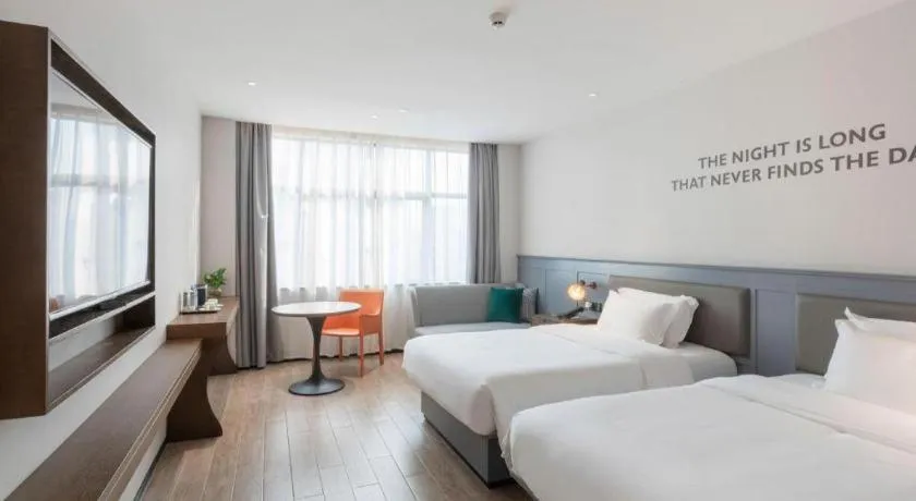 Bed in City Comfort Premier Hotel Nanning Guangxi University Zoo Metro Station