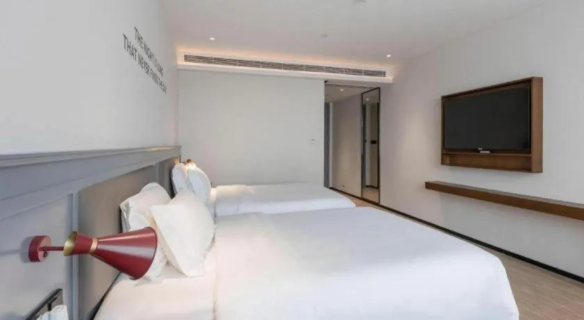 Bed in City Comfort Premier Hotel Nanning Guangxi University Zoo Metro Station