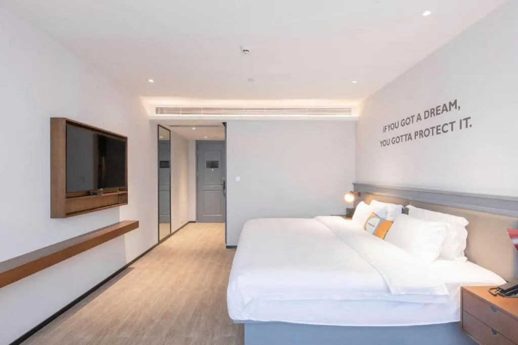 Bed in City Comfort Premier Hotel Nanning Guangxi University Zoo Metro Station