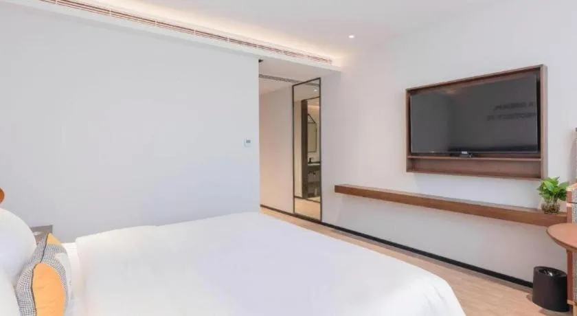 Bed in City Comfort Premier Hotel Nanning Guangxi University Zoo Metro Station