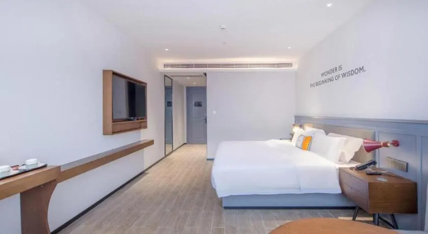 Bed in City Comfort Premier Hotel Nanning Guangxi University Zoo Metro Station