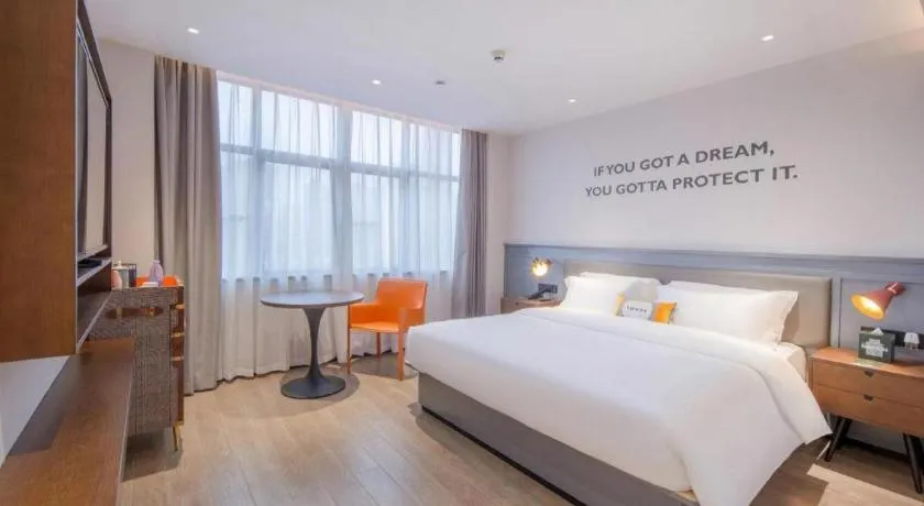 Bed in City Comfort Premier Hotel Nanning Guangxi University Zoo Metro Station