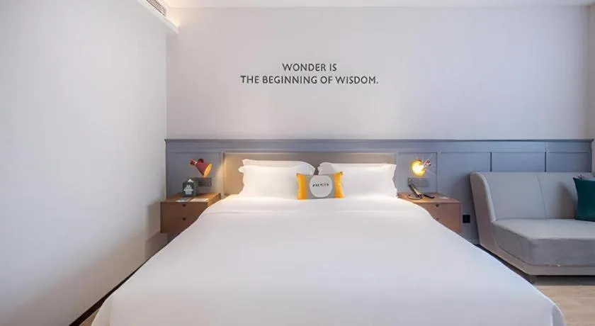 Bed in City Comfort Premier Hotel Nanning Guangxi University Zoo Metro Station