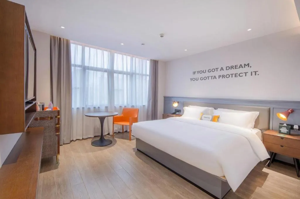 Bed in City Comfort Premier Hotel Nanning Guangxi University Zoo Metro Station