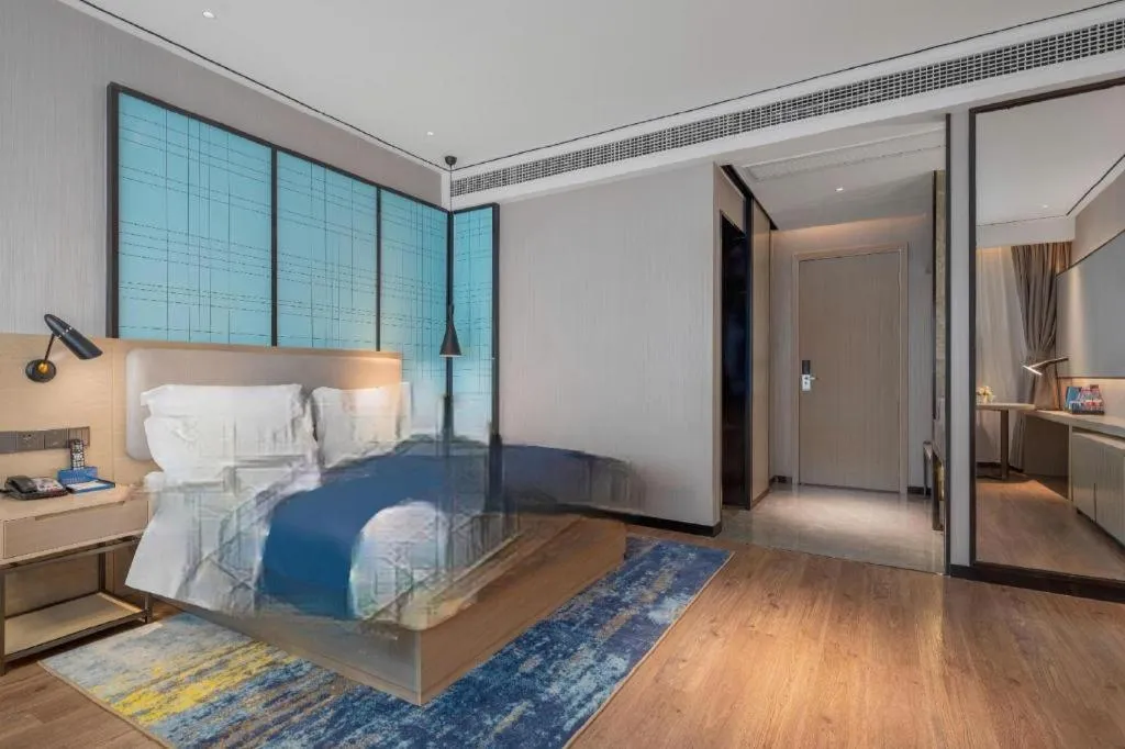 Bed in Echarm Hotel Zhuzhou Liling