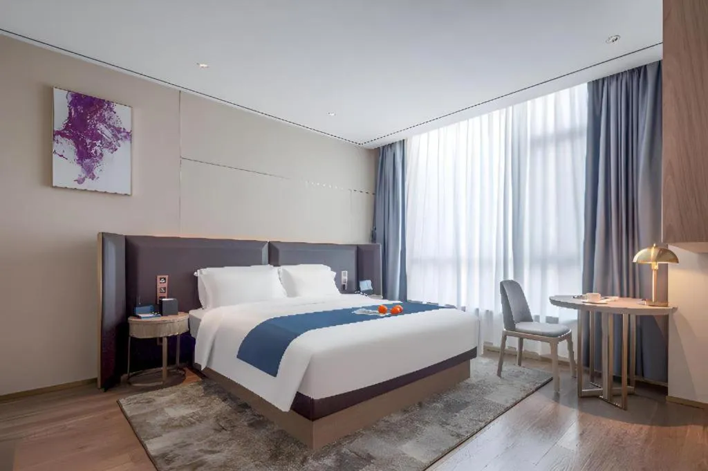 Bed in Echarm Hotel Zhuzhou Liling