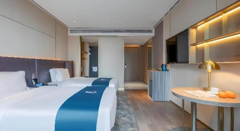 Bed in Echarm Hotel Zhuzhou Liling