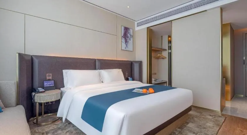 Bed in Echarm Hotel Zhuzhou Liling