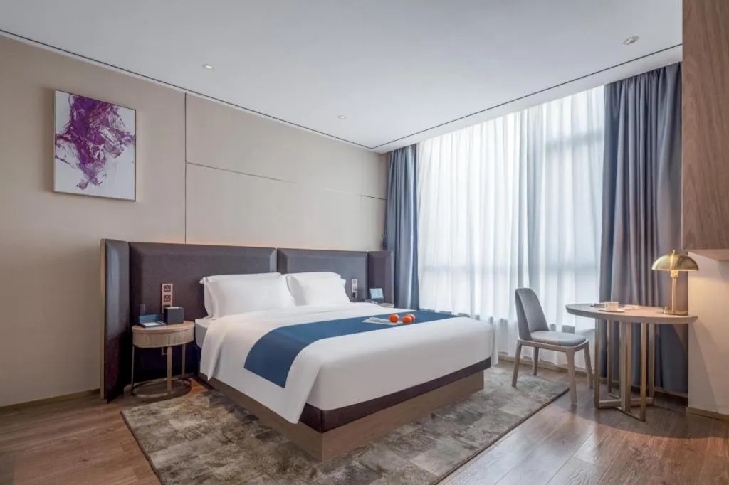 Bed in Echarm Hotel Zhuzhou Liling