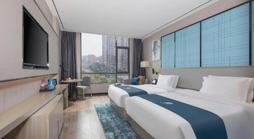 Bed in Echarm Hotel Zhuzhou Liling