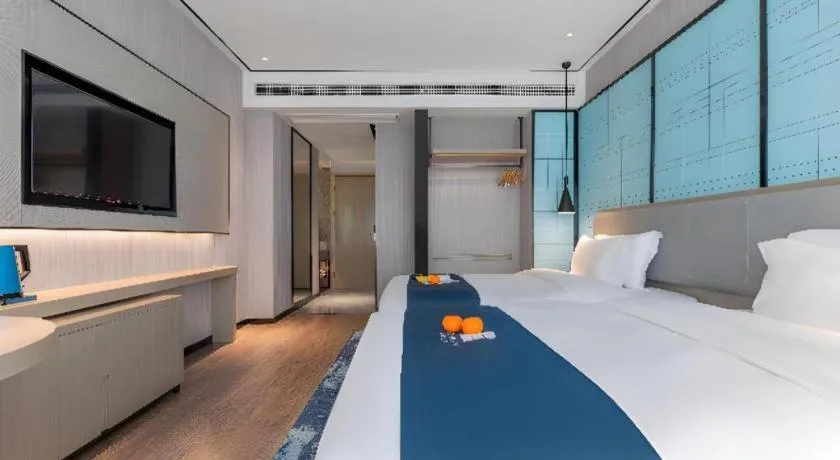 Bed in Echarm Hotel Zhuzhou Liling