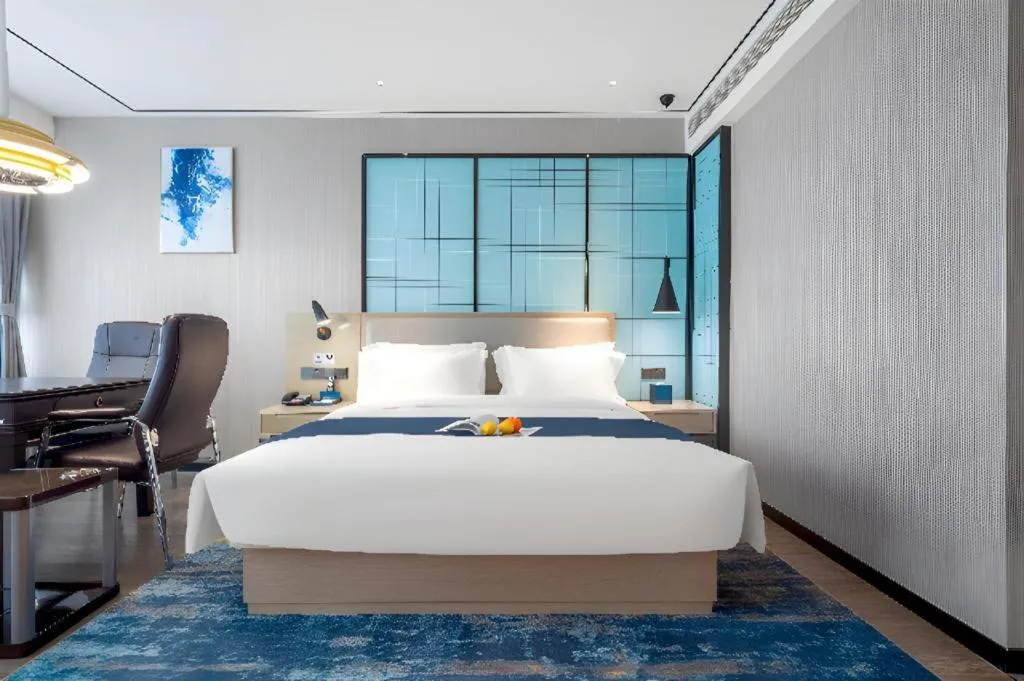 Bed in Echarm Hotel Zhuzhou Liling
